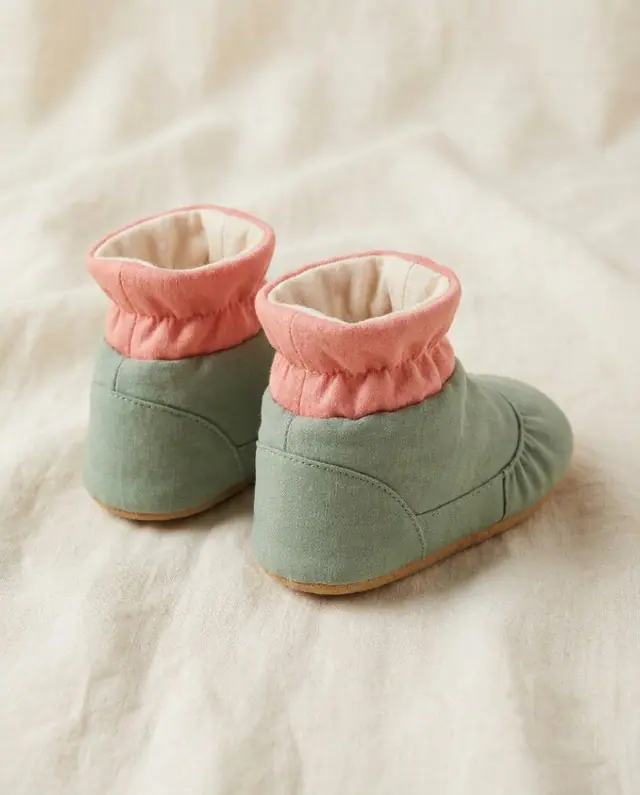 A finished baby booties sewn from the Sewzy pattern, view 2