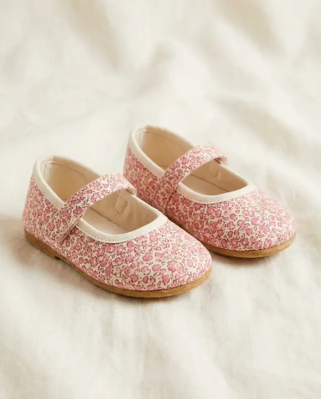 A finished baby mary janes sewn from the Sewzy pattern