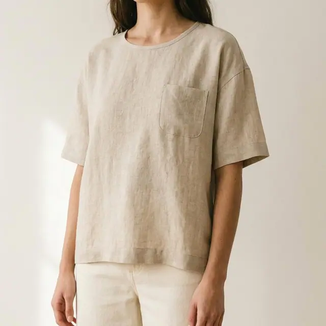 A natural linen boxy tee with a chest pocket