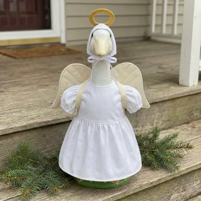 A porch goose wearing the angel outfit