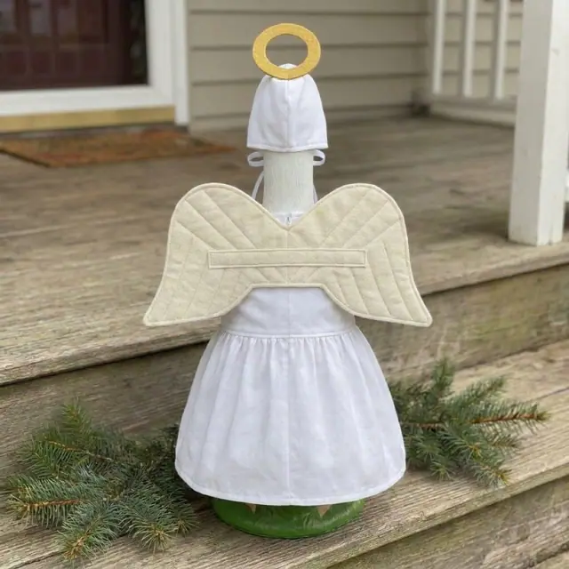 A porch goose wearing the angel outfit, view 2