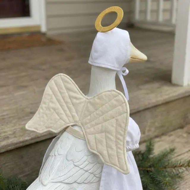 A porch goose wearing the angel outfit, view 3