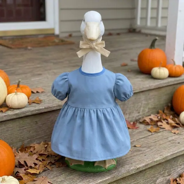 A porch goose wearing the Porch Goose Easy Dress
