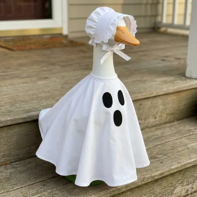 A porch goose wearing the ghost outfit