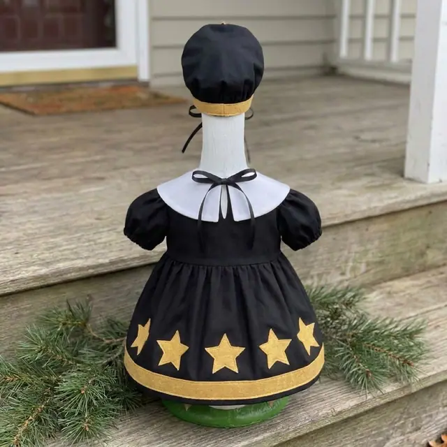 A porch goose wearing the New Year's Eve outfit, view 2