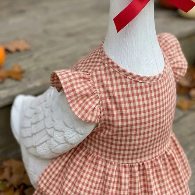 A porch goose wearing the Porch Goose Outfit, view 3
