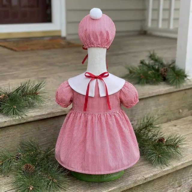A porch goose wearing the pajamas outfit, view 2
