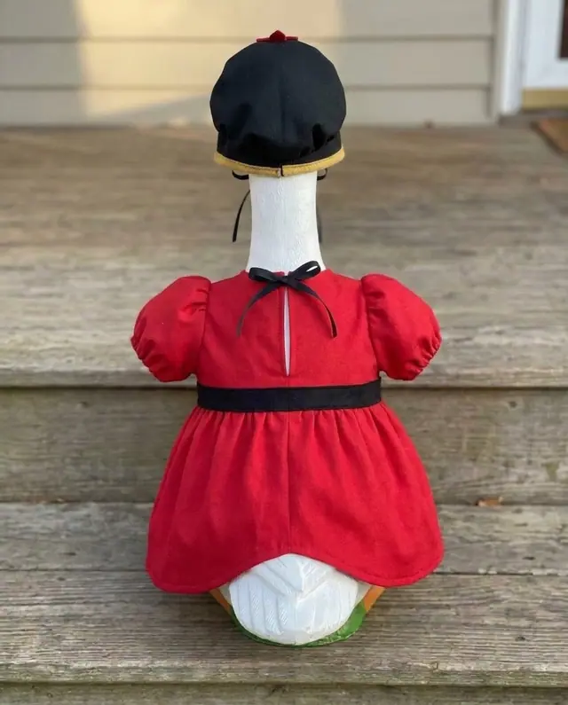 A porch goose wearing the toy soldier outfit, view 2