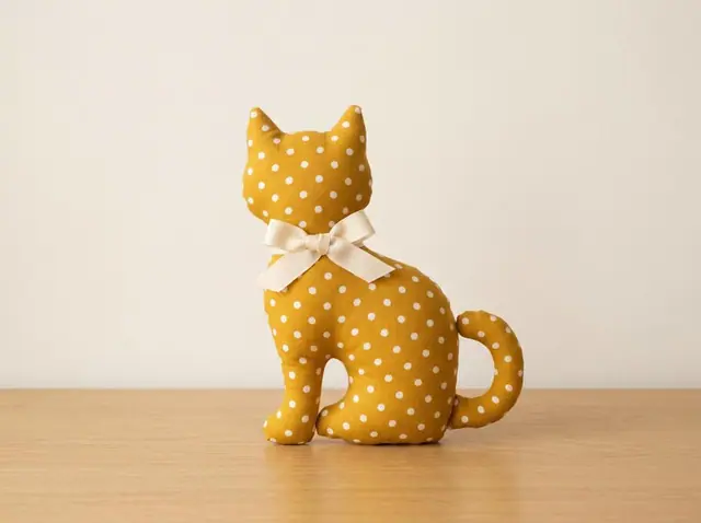 Memory Cat, a finished stuffed toy sewn from the pattern