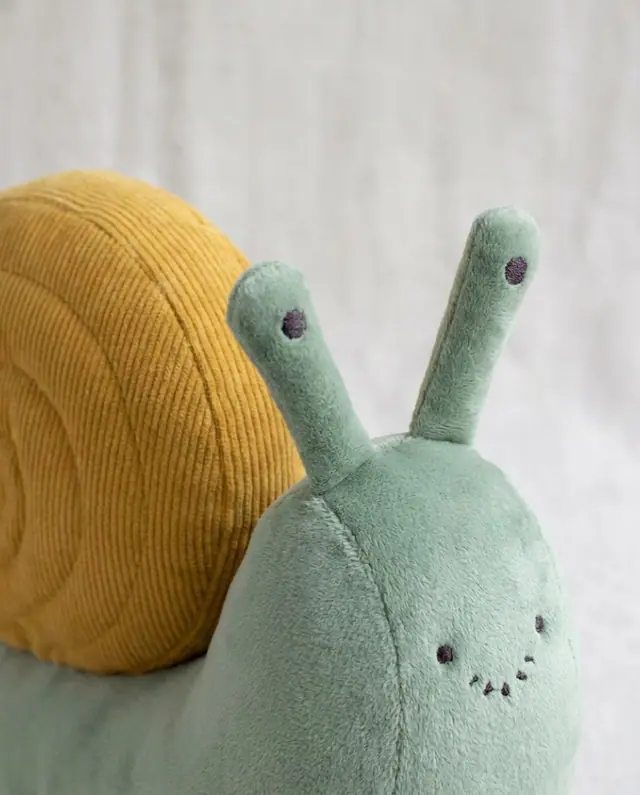 Snail Plush, a finished stuffed toy sewn from the pattern, view 3