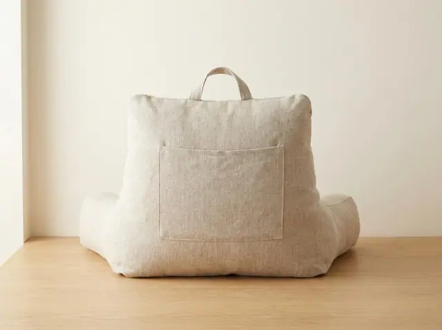 A finished reading pillow sewn from the Sewzy pattern
